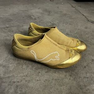 Puma gold sneakers